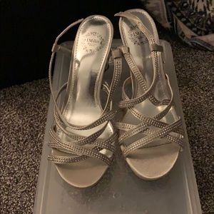 Brand new silver shoes with silver accents